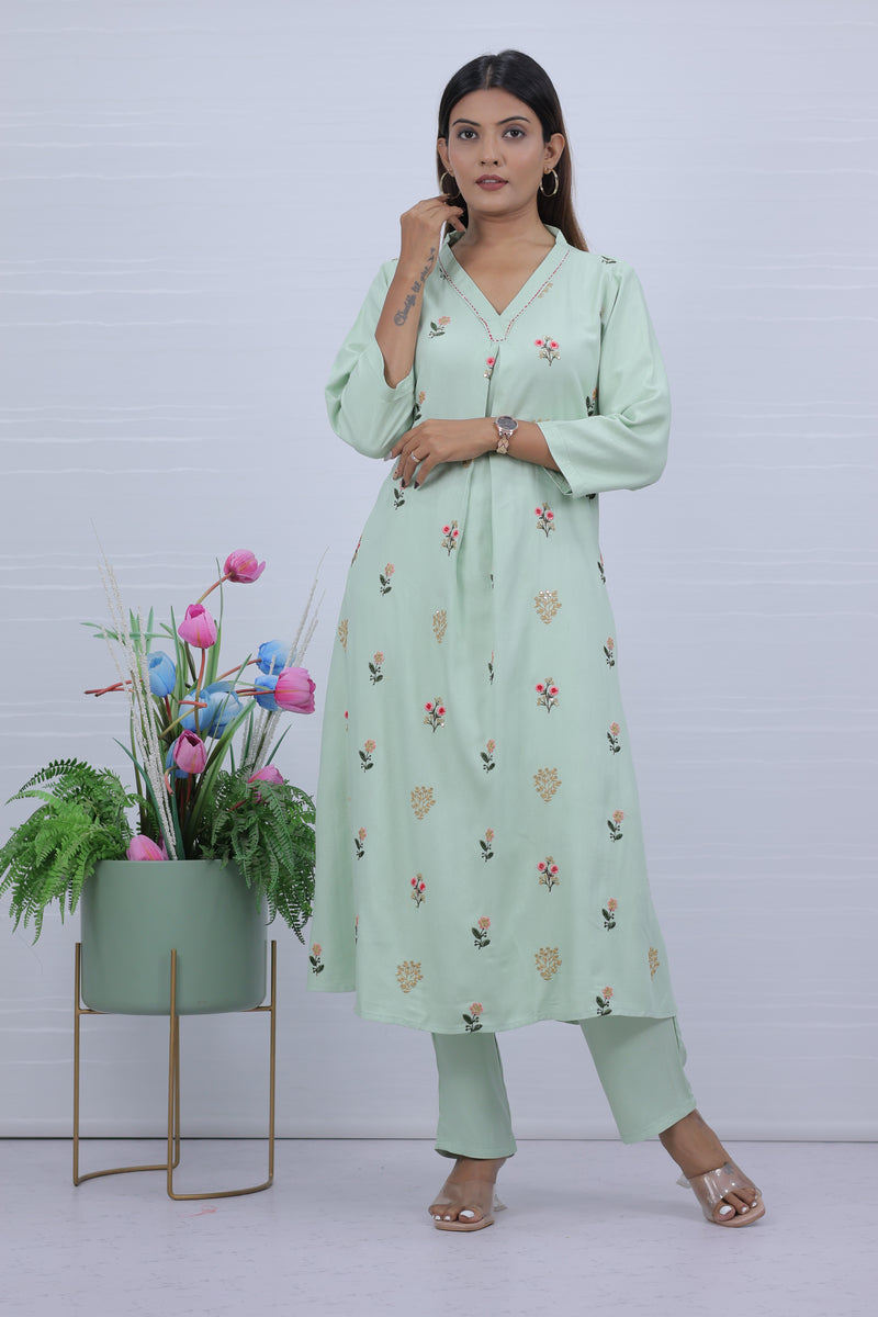Women Pista Hand Embroidered Kurta with Pant