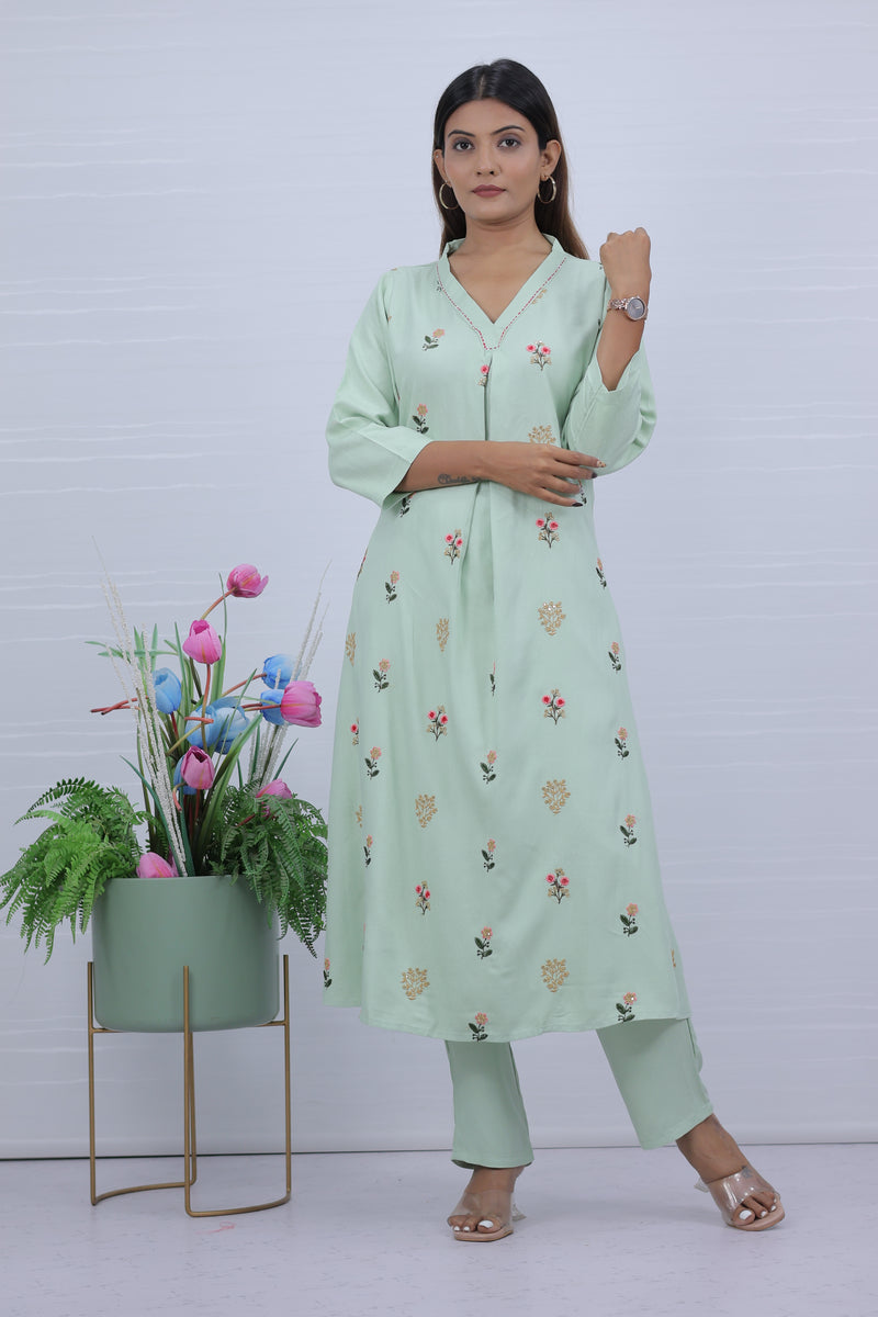 Women Pista Hand Embroidered Kurta with Pant
